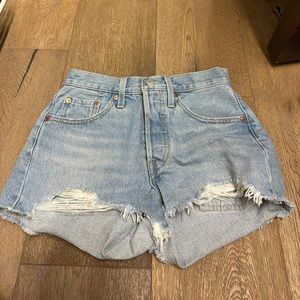 These blue Jean shorts from levis and are a size 23